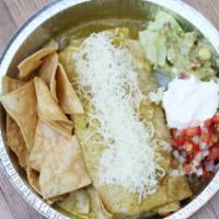 Wet Burrito · Flour tortilla with rice, whole beans, cheese, your choice of meat or veggies. Side of lettu...