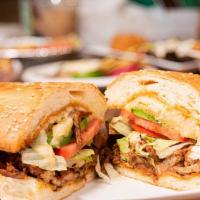 Torta Regular · Refried beans, lettuce, tomato, avocado, jalapeno, chipotle mayo, cheese and your choice of ...