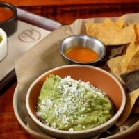 Guacamole con Queso Fresco · Comes with chips, and 3 house-made salsas