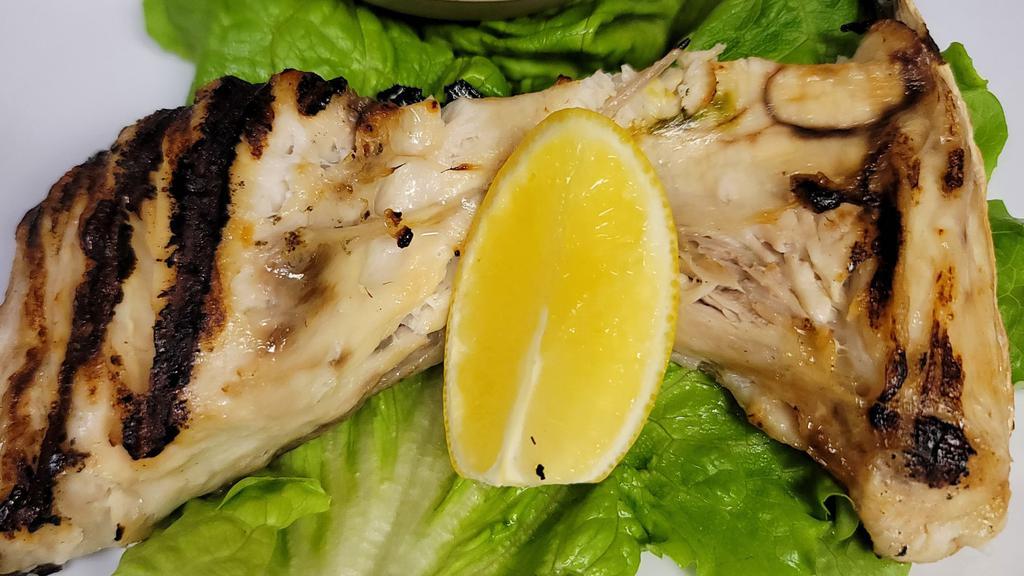 Hamachi Kama (1 Piece) · Lightly salted charbroiled yellowtail neck.