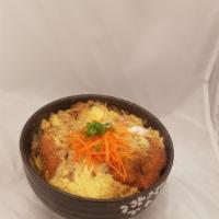 Chicken Katsu Donburi    · breaded chicken loin, vegetables & scrambled eggs simmered with house sauce. served over ric...