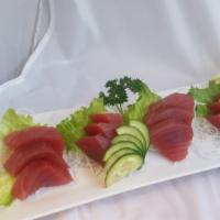 Maguro Sashimi   
 · fresh slices of tuna. 12 pieces