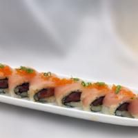 Asahi Roll · spicy yellow tail top w/ white tuna, tobiko, green onion.