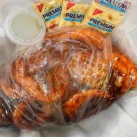 Spicy Shrimp Boil · Head and Tail-on shrimp, tossed in a bag with our homemade spicy garlic sauce. Includes a pi...
