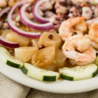Botana Mazatlan · Cooked shrimp, raw pickled shrimp, scallops, octopus and shrimp ceviche topped with imported...