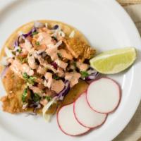 Baja Fish Taco · Breaded fish, topped with pico de gallo, cabbage and spicy house dressing.