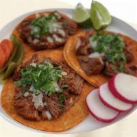 Birria Taco · Shredded Beef Birria with Red Onion and Cilantro. sold individually