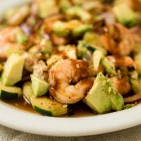 Aguachile El Tamarindo · Raw shrimp and cooked shrimp pickled in lime juice. Tossed with choice of sauce, cucumber an...