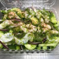Aguachile Verde · Raw shrimp pickled in lime juice, tossed with green sauce, cucumber and onion, topped with c...