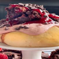 Razzle Dazzle Roll 
 · decadent chocolate raspberry frosting topped with homemade brownie bites, chocolate chips, a...