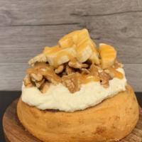 Golden Ticket · Caramel frosting topped with bananas, walnuts, and caramel sauce.