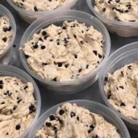 Cookie Dough Container (8 oz.) · Raw cookie dough. Safe to consume right out of the container. Has baking instructions on lid.