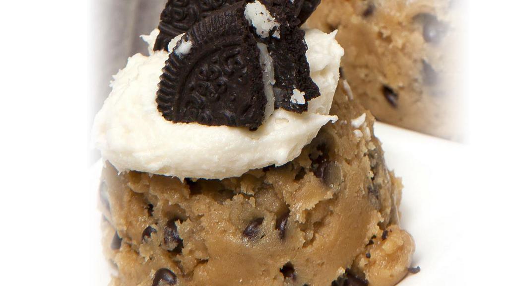 Cookie Dough Scoop - Cookies & Cream · our homemade cookie dough topped with a dollop of cream cheese frosting and 