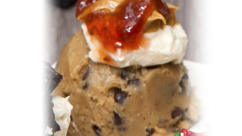 Cookie Dough Scoop - Pb&J · our homemade cookie dough topped with a dollop of peanut butter frosting and a drizzle of strawberry jam