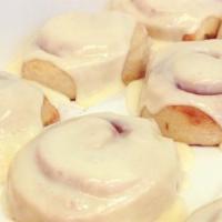 Dozen OS rolls · 12 cinnamon rolls frosted with our traditional vanilla frosting. Please allow 1 hour for fre...