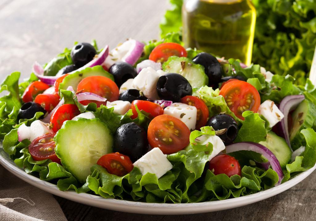Greek Salad · Lettuce, Tomatoes, Onions, Cilantro, Feta cheese, and House dressing.