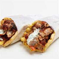 Combo Gyros · Signature combo gyro made with chicken and lamb, freshly grilled veggies and tzatziki sauce,...