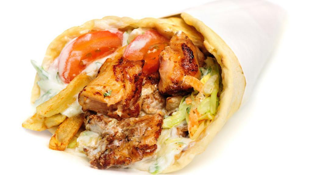 Chicken Gyros · Mediterranean-styled chicken shawarma, with freshly grilled veggies and tzatziki sauce, wrapped in wholesome pita bread.
