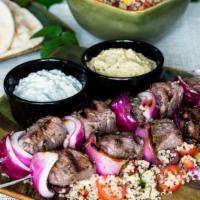 3 Combo Kabob Plate · Chicken, kefta and lamb kabobs with Mediterranean styled rice, hummus, Greek salad, warm pit...