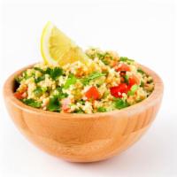 Tabouleh Salad · Freshly chopped parsley, bulgur wheat, chopped red onions, diced red tomatoes and EVOO.