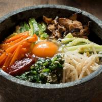 Bibimbap · Assorted seasoned vegetables, choice of protein, and side of home made bibimbap sauce.
