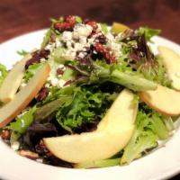Magnolia Salad · Organic mixed greens, blue cheese, apples, candied walnuts, apple cider vinaigrette.
