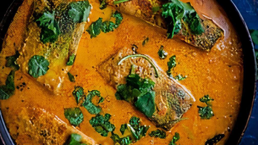 Fish Curry · Fish cooked in traditional sauces and spices