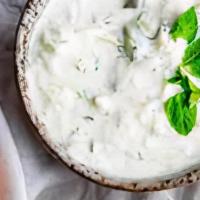 Raita · Homemade yogurt with cucumber and spices