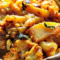 Aloo Gobi · Cauliflower cooked with spices and potatoes