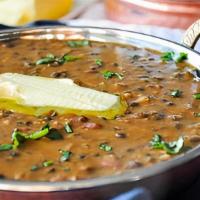 Daal Makhani · Buttery lentils cooked with onions, tomatoes and spices