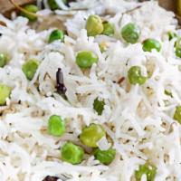 Rice Pilaf · Saffron flavored basmati rice garnished with green peas