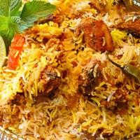Veggie Briyani · Fresh rice with mixed vegetables cooked in onions and spices