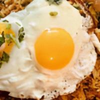 Punjabi Fried Rice · Basmati rice fried with potatoes, egg & green peas