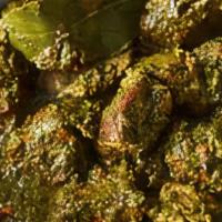 Lamb Saag · Lamb stewed with freshly ground spices and spinach.