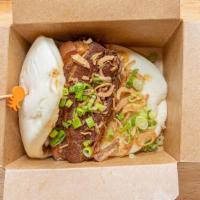 Pork Belly Bun · Slow cooked pork belly, with fried onion and scallion