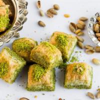 Pistachio · Buttery, flaky phyllo dough soaked in honey and sugar, stuffed and topped with tender pistac...