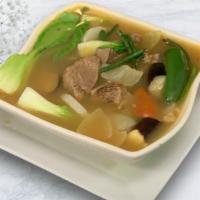 Beef Sinigang · Tamarind flavored beef soup with beef cubes and assorted Asian vegetables.  Sourly good