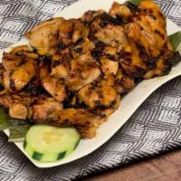 Chicken Inasal · Boneless grilled chicken marinated in soy sauce, lemon and lemongrass.