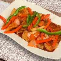 Fish Fillet Escabeche · Breaded boneless fish fillet, cucumber, peppers and onions in sweet & sour sauce