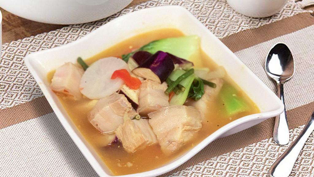 Pork Sinigang · Pork cubes in tamarind based soup with long beans, bok choy and chinese eggplant