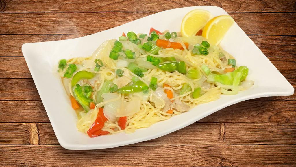 Pancit Canton · Chinoy canton noodles wok fried with shrimp, chicken and vegetables.