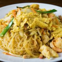 Singapore Noodles · Stir-fried vermicelli rice noodles in curry sauce with shrimps, chicken, pork, vegetables an...