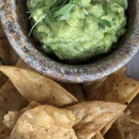Guacamole + Chips · Avocado, jalapeño, cilantro, lime with house-made chips