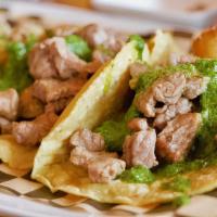 Chimichurri Tacos · Pan seared skirt steak, fingerling potateos, chimichurri sauce.