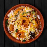 Prawn Biryani Special · Long grained rice flavored with fragrant spices flavored along with saffron and layered with...