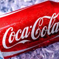 Coke / 可乐 · Size: can