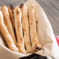 Breadsticks · Our famous pizza dough breadsticks served with your choice of butter, pizza sauce, or ranch ...