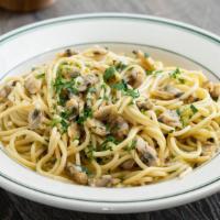 Spaghetti with Clams · Baby clams and spaghetti tossed in a white wine sauce with garlic, red pepper flakes and oli...