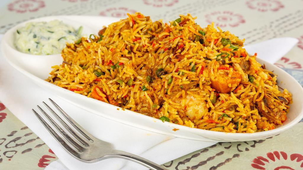 Himalayan Briyani · A mix of chicken, lamb, fish, and shrimp and basmati rice fried with onion and peas with some nepalies spices