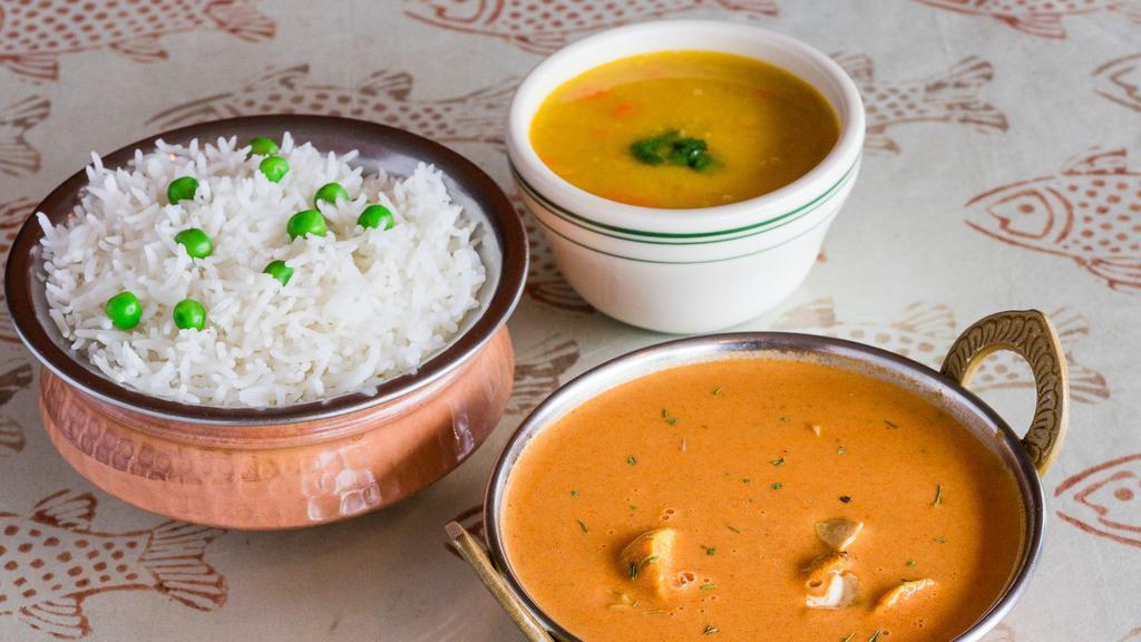 Chicken Tikka Masala · Boneless chicken breast delicately spiced, grilled in a clay oven, and cooked with a creamy sauce.